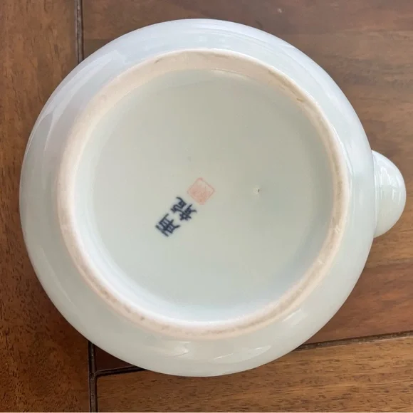 Elegant Ceramic Teapot with Woven Handle